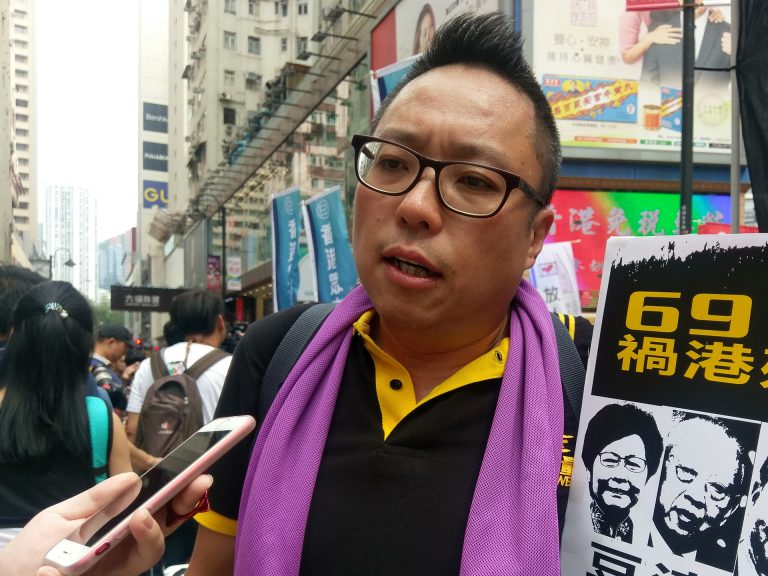 譚得志
