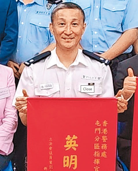 先後擔任打鼓嶺、青山及屯門的分區指揮官的梁嘉文,梁現已被停職。
