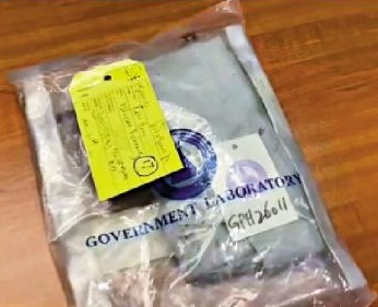 懷疑涉案匪徒犯案時身穿的染血的T-shirt。